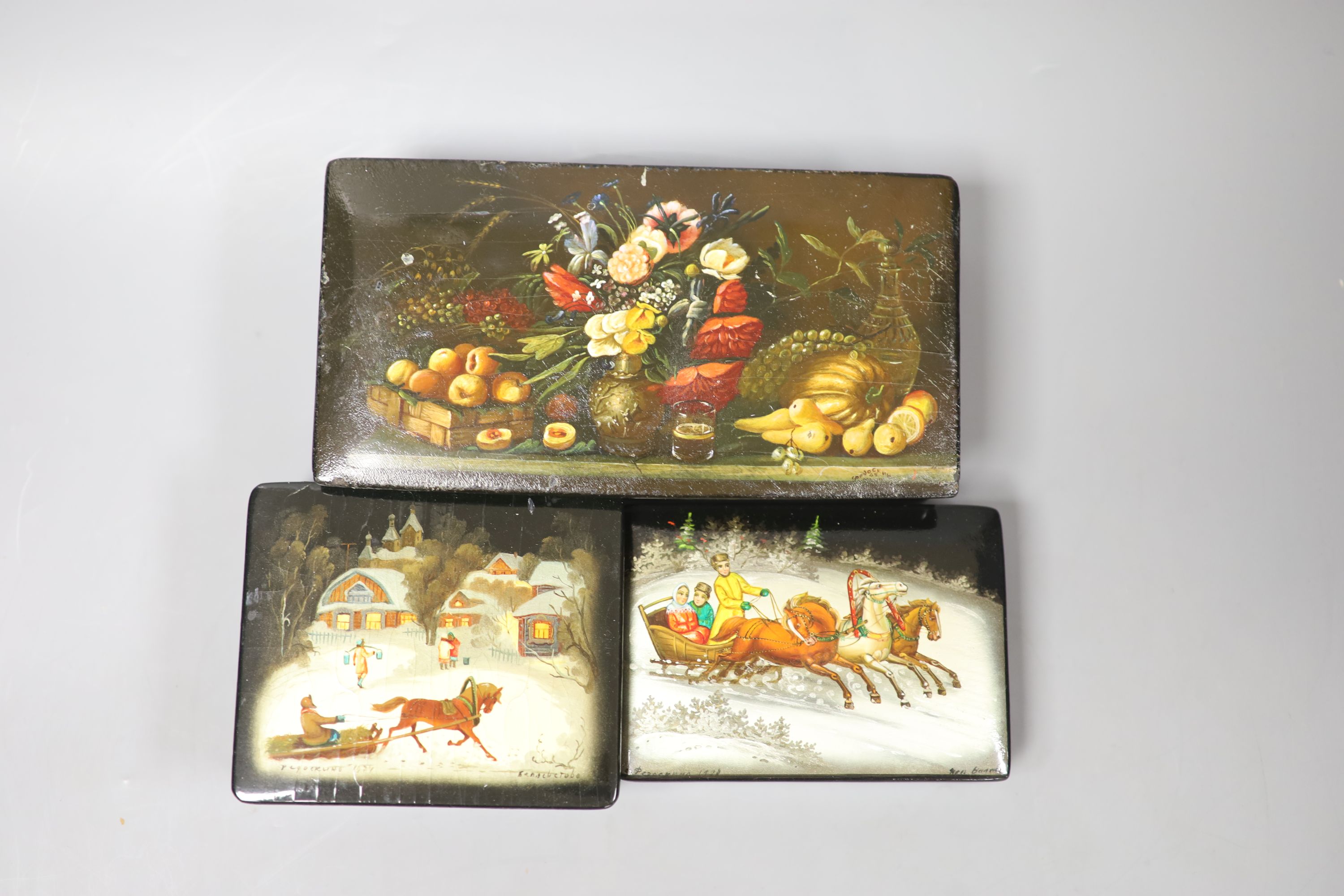 Twelve Russian or Persian Papier mache boxes